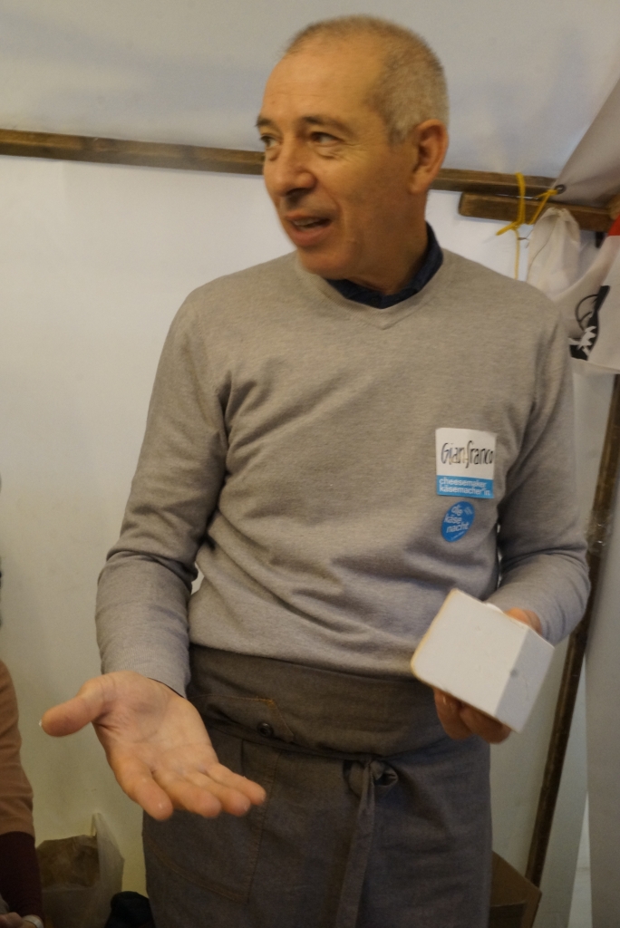 The Cheesemaker of Debbene, Sardinia, explaining how he smokes the ricotta