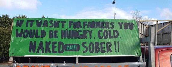 Poster saying: If it wasn't for farmers you would be hungry, cold, naked and sober.