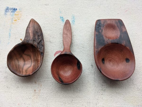 three wooden spoons